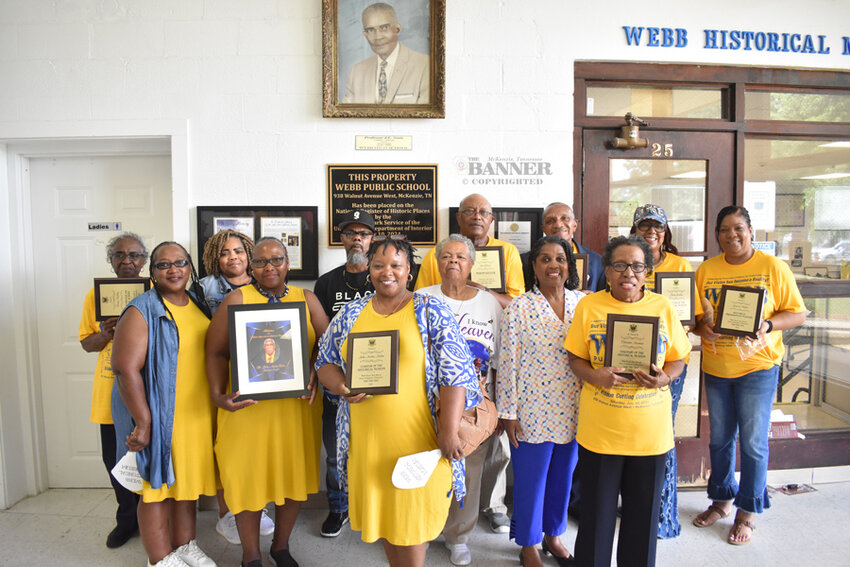 Several Webb alumni were presented plaques for their contributions. Family members accepted the plaques of John Nolen and the late Clarence Norman. (L to R) Front Row: Velma Caster Nolen, Lina McClerkin Nolen, Tammie Parsley Nolen, Gloria Nolen, Gina (Norman) Atkins and Ruby Norman. Back Row: Daisy Dudley, Harriet Nolen Bonds, George Nolen Jr., Ike Gilbert, Neal Willamson, Mary Luter Jordan and Kimberly Bell Webb (holding Jessica Baker’s plaque).