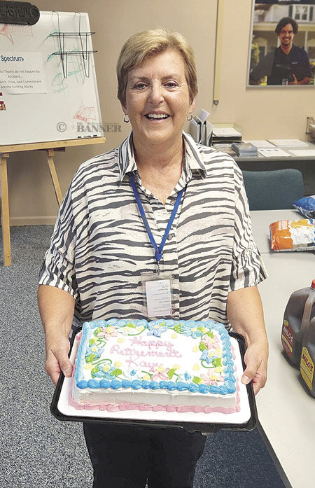 Kay Brown was treated with a cookout and a cake to mark her retirement after 57 years. Photo courtesy Spectrum