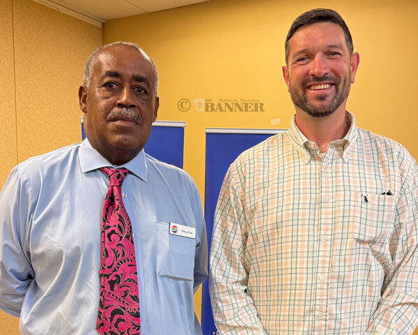 Thompson is pictured with Ricky Price, vice-president of McKenzie Rotary Club.