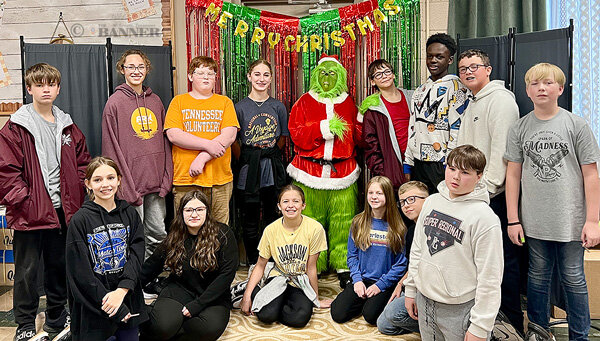 Pictured at the Candyland event are (L to R) Front Row: Lillian Barnes, Emily Krammer, Delaynie Bennett, Madelyn Cooper, Teddy Zamecnik and Balean Jiines. Back Row: Jonah McGowan, Ally Baker, Tracy Hughes, Kinsley Newsome, The Grinch, Jacob Barber, Ian Pearson, Owen Nelson and Cooper Latch.