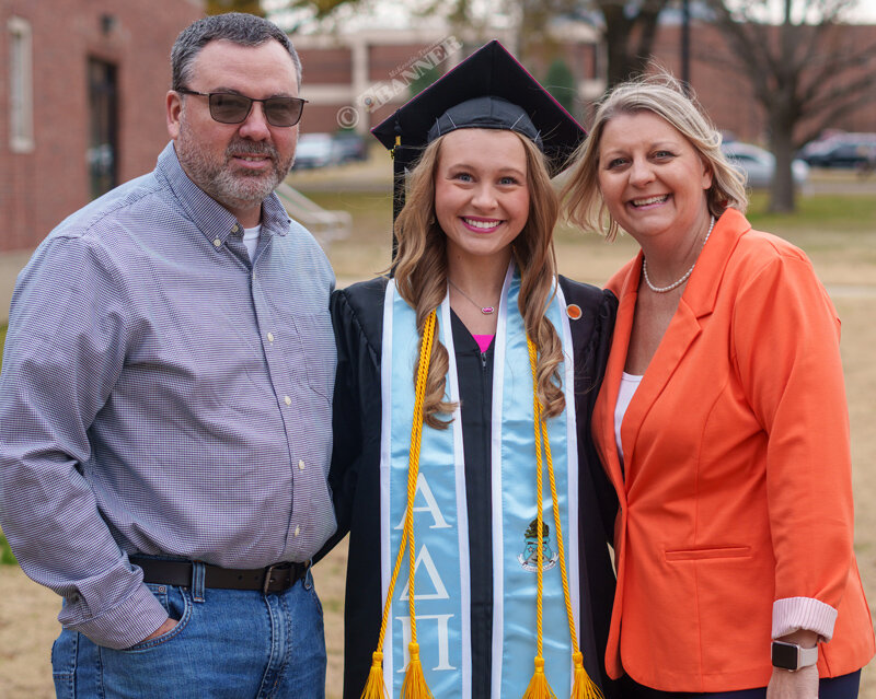 Joining Drewry at the commencement ceremony were her parents, David (left) and Mandy Drewry (right).