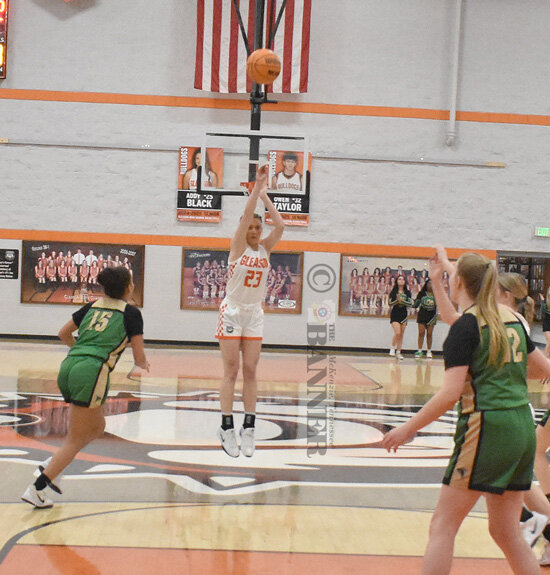Lady Bulldog Hylan Leach hits a three-pointer from the top of the key. Leach scored eleven points in Gleason’s win.