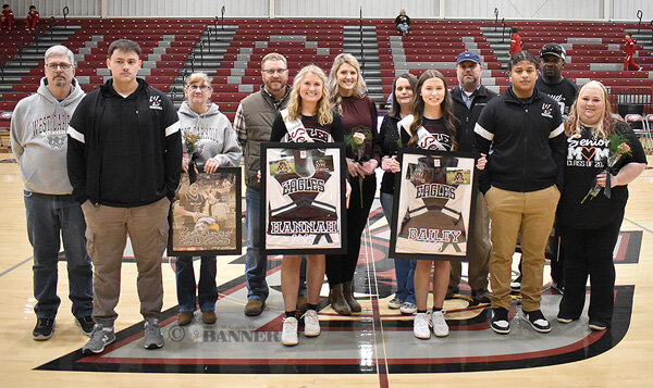 West Carroll senior basketball players and cheerleaders were honored before the games. Pictured are (L to R): War Eagle Ryder Krawczyk, escorted by grandparents Mike and Terri Krawczyk, cheerleader Hannah Fowler, escorted by parents Jeremy and Brittany Fowler, cheerleader Bailey Rogers, escorted by parents Daniel and Kelly Rogers, and War Eagle Kayden Melton, escorted by parents Dameon and Mary Melton.