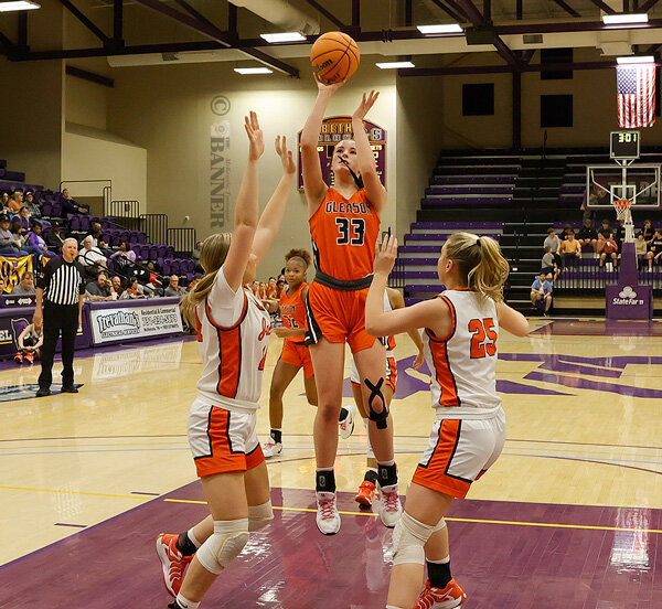 Lady Bulldog Skylar Arnold elevates in the paint for two points. Arnold led all scorers with 16 points in the consolation game.