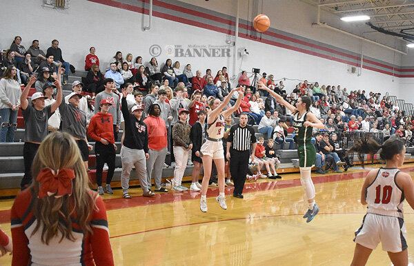 Lady Rebel Molly French fires one of her five three-pointers. French led all scorers (tie) with 21 points.