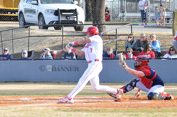 Rebel Cole Brown connects for a base hit.