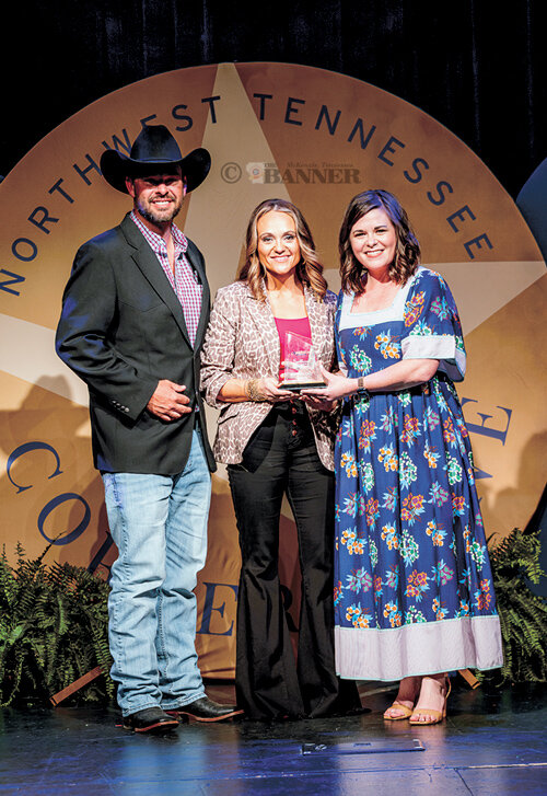 Michael Avery and Tosha Gurley of Southland Safari Cabins and Guided Tours of Clarksburg with Kasey Muench, executive director of Northwest Tennessee Tourism Association. Southland earned Top Attraction. Avery also earned a separate award.