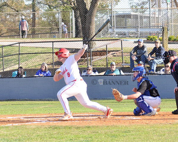 Rebel Maddox Shiell launches a three-run double in the first inning.