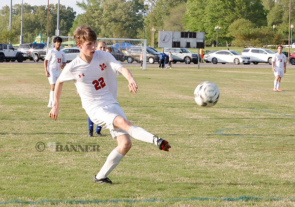 Rebel Caleb Burns scores.