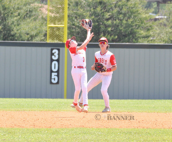 Rebel second baseman Lane Brown catches a shallow pop-up in Saturday morning's game.