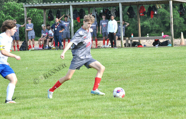 Rebel goalkeeper Nate Dameron makes the stop on a Central penalty kick.