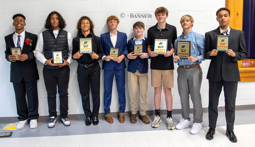 MUSTANG BASKETBALL AWARDS – from left: Darius Pratcher, Riley Ford, Kingston Smith, Johns Nolen, Rush Sanders, William Boals, Kyle Byrd, and Mykel Govan. Photo by Russell Bush