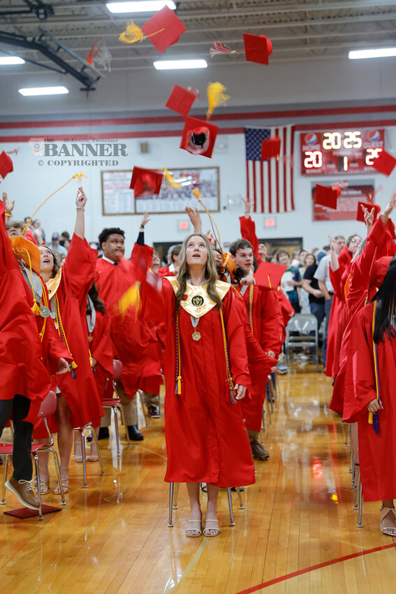 The toss of the caps marked the end of the ceremony.