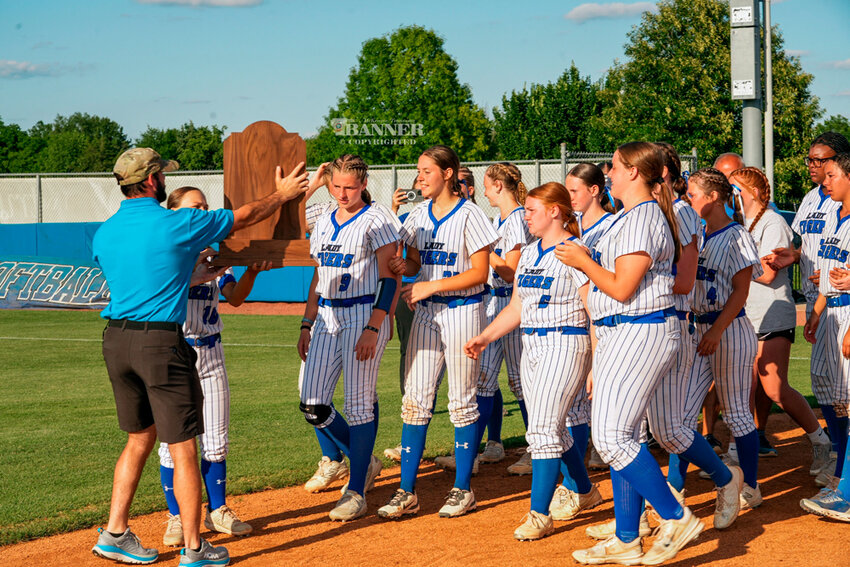 The Central Lady Tigers are awarded the TSSAA 1A softball trophy.