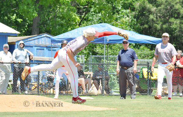 Rebel pitcher Fletcher Holt catches a short pop fly coming off the back of the mound.