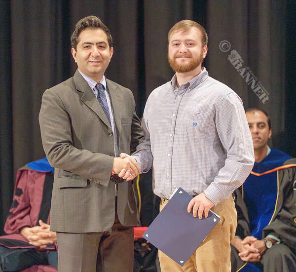 MARTIN (May 3) &mdash; Nathan Robison of Bruceton (right), a 2025 bachelor&rsquo;s degree recipient in engineering from the University of Tennessee at Martin, was inducted into the Order of the Engineer on May 3. He is shown with Dr. Ali Nasirian, assistant professor of engineering. The Order of the Engineer was established in 1970 to foster a spirit of pride and responsibility in the engineering profession. In the ceremony, graduates and registered engineers are invited to accept the Obligation of the Engineer and receive a stainless steel ring. For more information about the UTM Department of Engineering, visit www.utm.edu/engineering or call 731-881-7571. For more information about UT Martin, visit www.utm.edu or call 1-800-829-UTM1 (-8861).