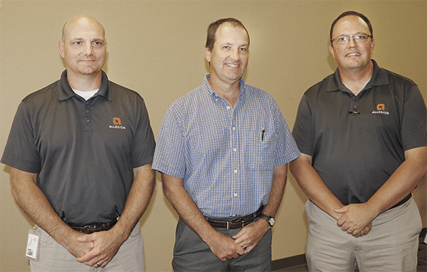 Chad Brawner (left) and Monte Bowers (right) were the featured speakers at McKenzie Rotary Club. Joe Neumair, center, was the program sponsor.