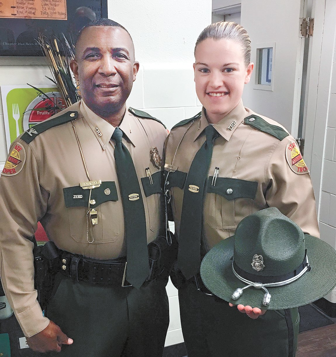 Colonel Dereck Stewart of the THP with Brenna Smith, a new member of the Tennessee Highway Patrol.