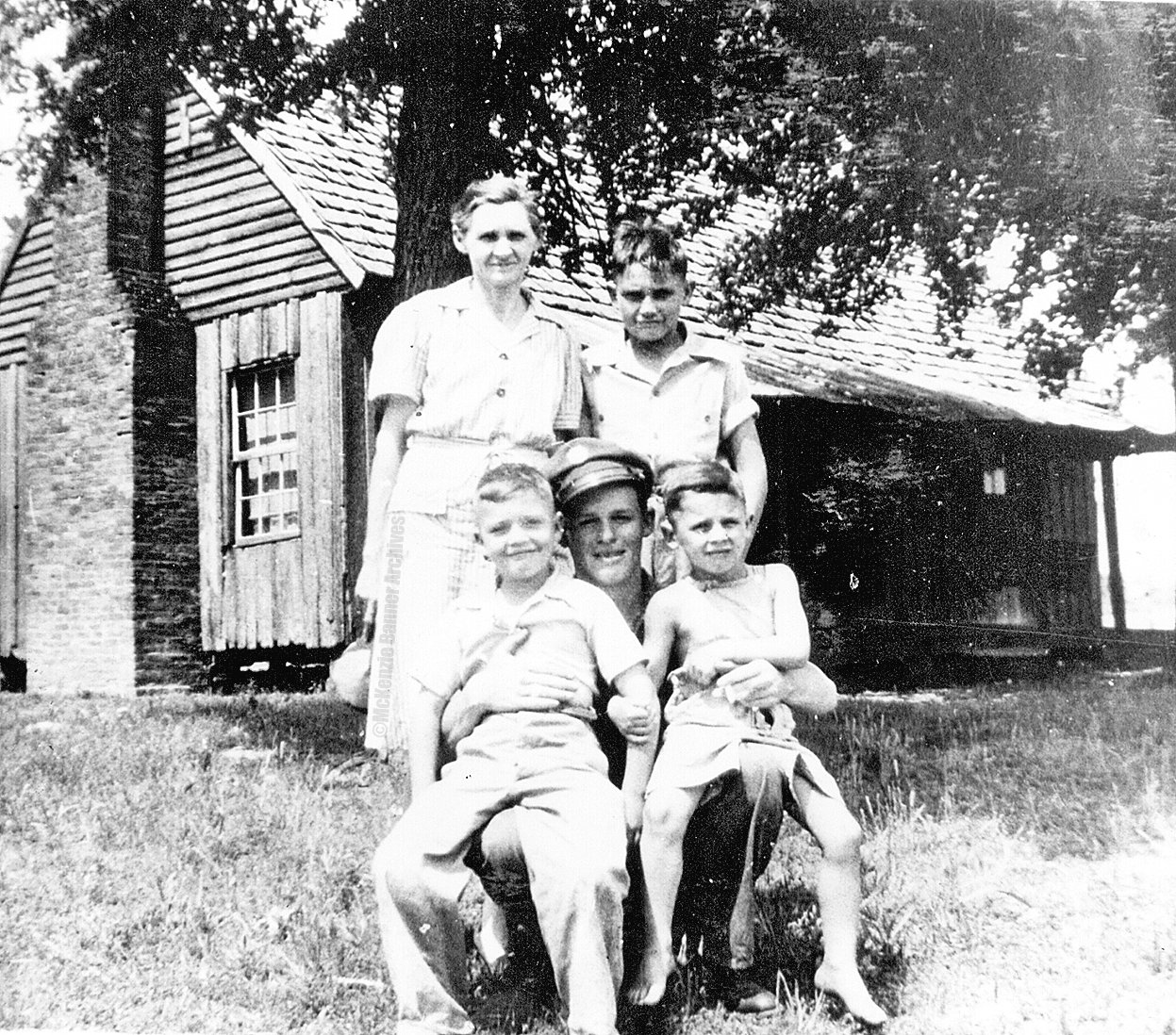 Standing: Louise and Austin. Front: Charlie, Warren and Wayne Cooper, 1946.