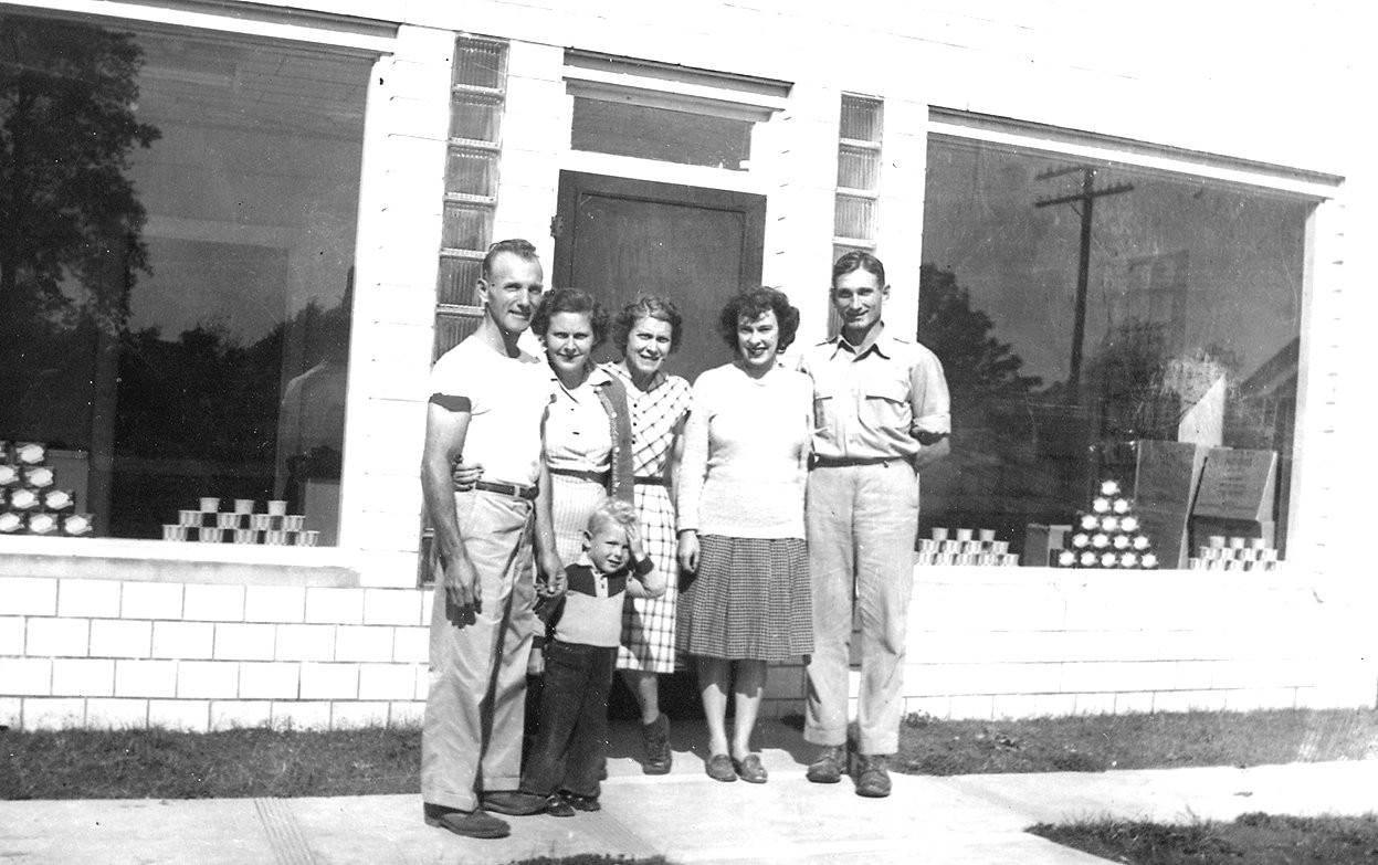 Holland Farms Ice Cream Company, 1947: Pictured: owners Paul G. Holland, Alma Holland, Mary Holland and Kermit Holland. Also pictured: Paul W. Holland, age 3, and Anne H. Waggoner.