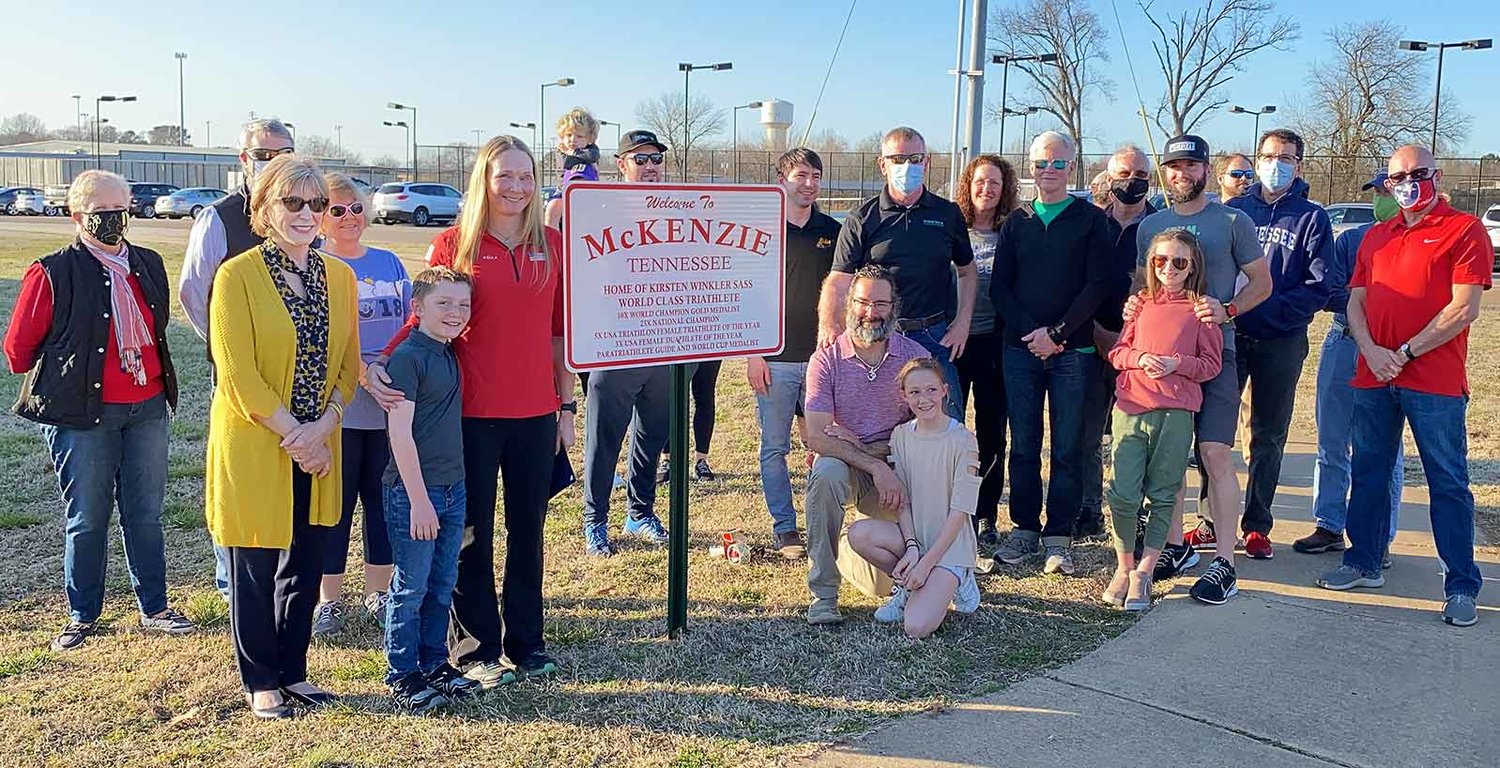 The unveiling of a sign to honor Kirsten Sass was on March 4, 2021 at the intersection of University Drive and Patriot Drive. Mayor Jill Holland read a proclamation detailing a few of Sass’s athletic accomplishments during the ceremony.