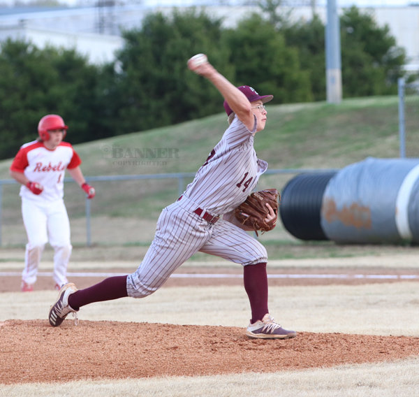 War Eagle Parker McAfee fires a pitch in Monday’s game at McKenzie.