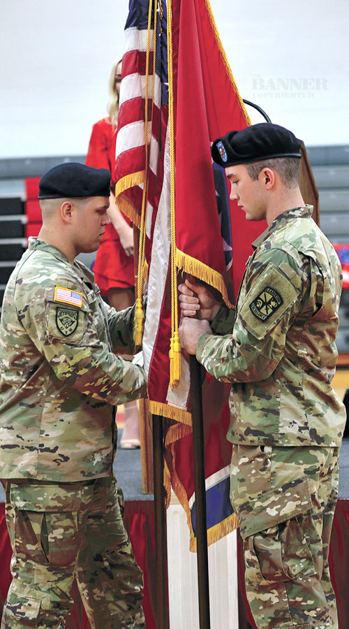 Guardsmen Brandon Boaz and A. J. Maxwell presented the flags at the event.