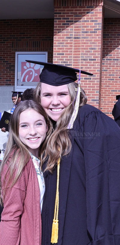 Emily Lunn celebrates her graduation with little sister, Carleigh. Emily’s parents, Craig and Tracy first met while students at Bethel.