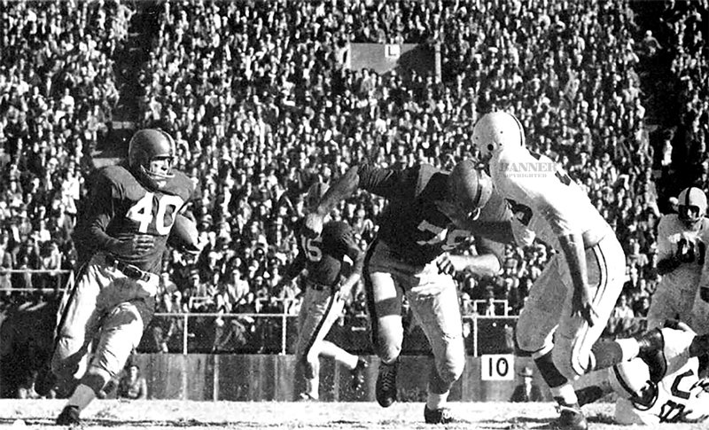 Gene Hickerson (79) prepares to throw a block for Paige Cothren (40) against Mississippi State.