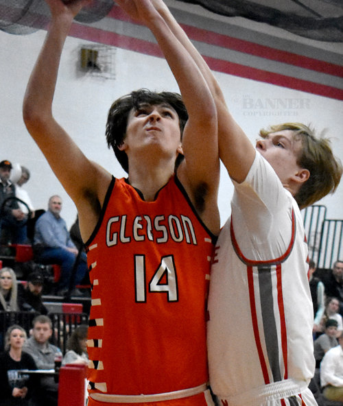 Gleason’s Cameron Thompson attempts a shot defended by Drew Chappell.