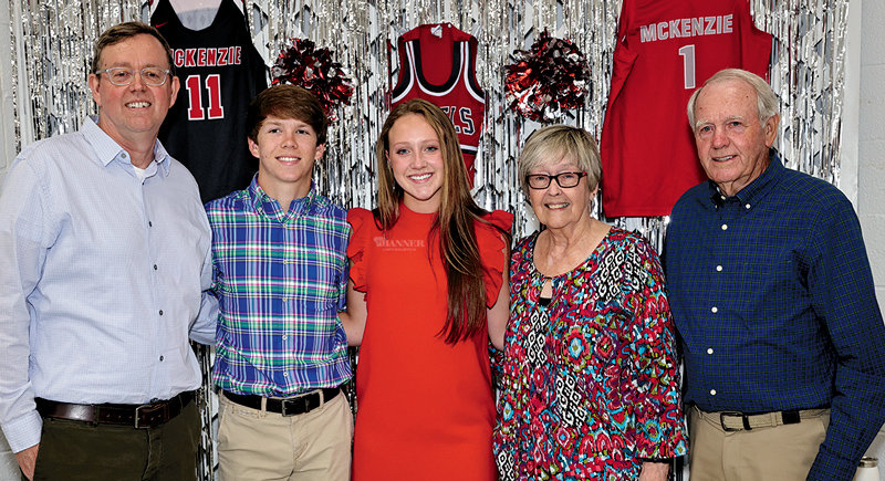 Andy Camp Memorial Award — Savannah Davis and Zayden McCaslin received the Andy Camp Memorial Award. They are joined by Brad Camp, Karen Camp and John Camp.