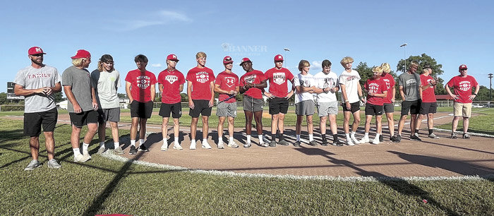The McKenzie Rebel Baseball Team joined the ceremony, high-fiving each player when his name was announced.