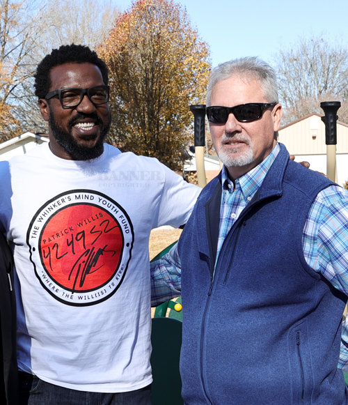 Patrick Willis and high school coach Rod Sturdivant at a December 2021 event in Bruceton. Willis donated exercise equipment to the Town of Bruceton.