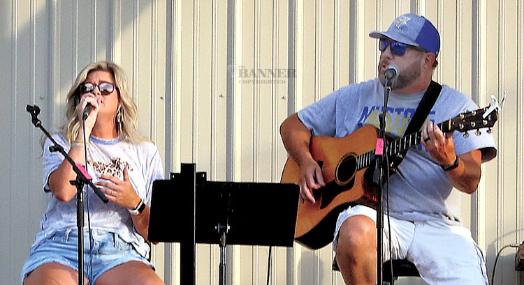 Brooke and Leslie Cooper provided an acoustic set of music from the balcony of Cornerstone restaurant.