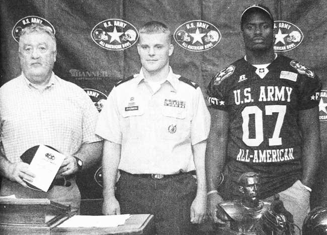 Huntingdon Mustangs Head Coach Mike Mansfield (left) joins Sgt. Overson (center) and Mustang Senior Chris Donald (right) at the U.S. Army All-American Bowl.