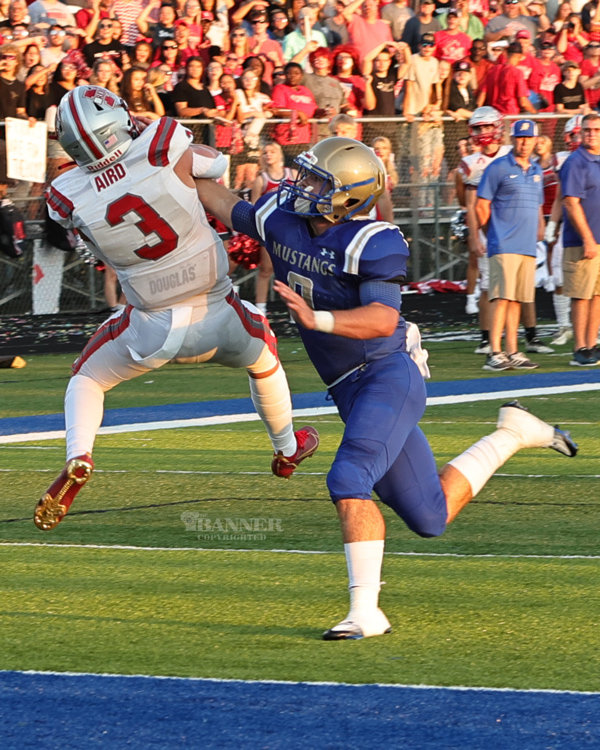 Rebel Zach Aird (#3) comes down with a touchdown catch.