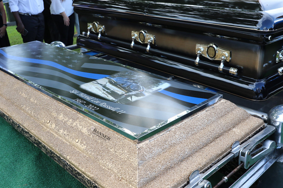 Sergeant Lee Russell’s vault was engraved with a photograph of Lee and his helicopter.