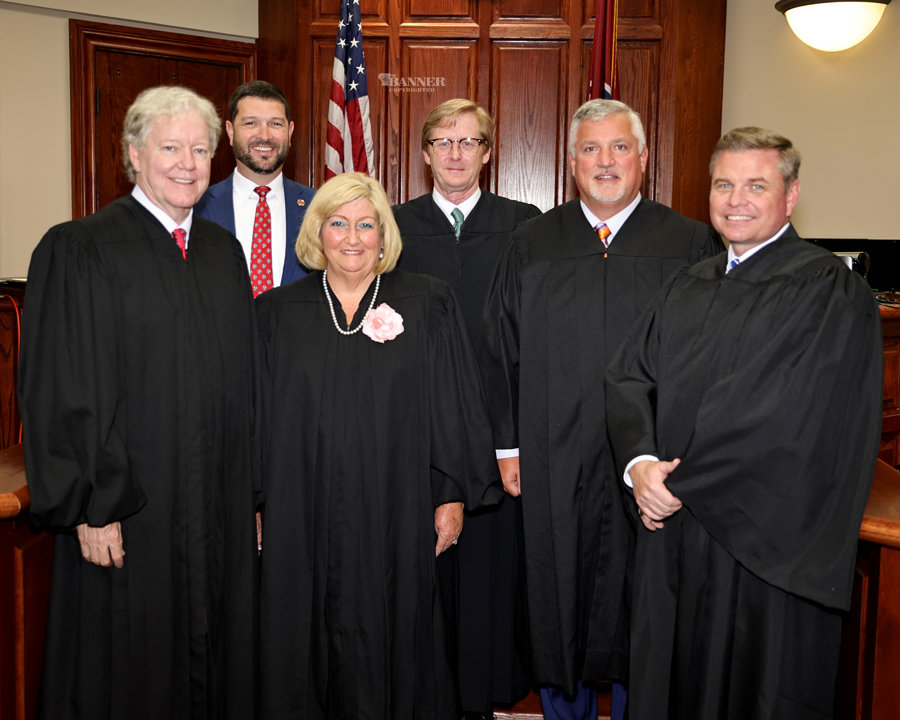 Members of the judiciary are: Chief Justice Roger A. Page, who administered the oath, Chancellor Vicki Hoover, Circuit Judge Brent Bradberry, and General Sessions Judge Michael King; (Back L-R) District Attorney Neil Thompson and Circuit Judge Bruce Griffey.