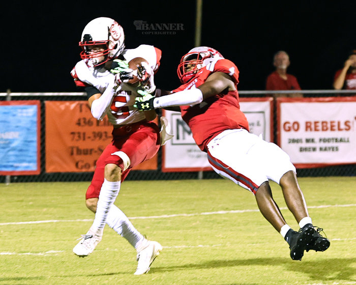 Rebel Zay Webber #4 strips an interception from #5 Hunt Pipkin of South Fulton for a 37-yard pass reception from Tate Surber to Webber.