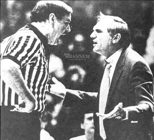 Dale Kelley (left) and Alabama Head Coach Wimp Sanderson (right) have a heated courtside exchange following a technical foul.