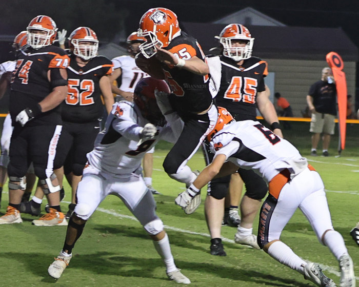 Drake Lovell (#25) leaps into the end zone in Gleason’s win over Greenfield.
