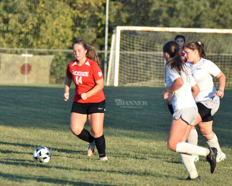 Kassidy Brown (14) working the ball against Milan.