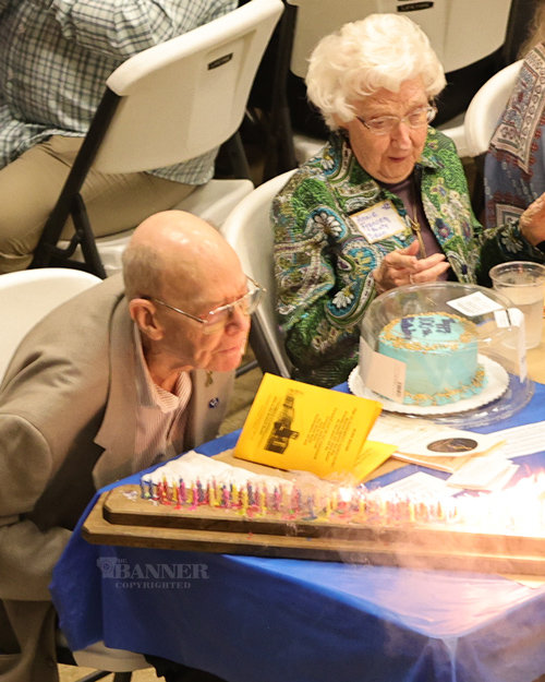 T.C. Chandler, age 100, was the oldest member of the alumni in attendance. Sitting beside  him is Annie Frances Dean, who was one of his classmates.