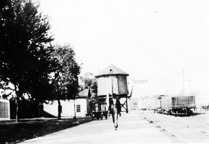 1917 photo of McKenzie railroad area with the old water tower.
