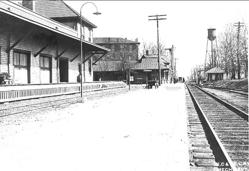Rail line in McKenzie with the McKenzie Hotel (left) and the depot in the background.