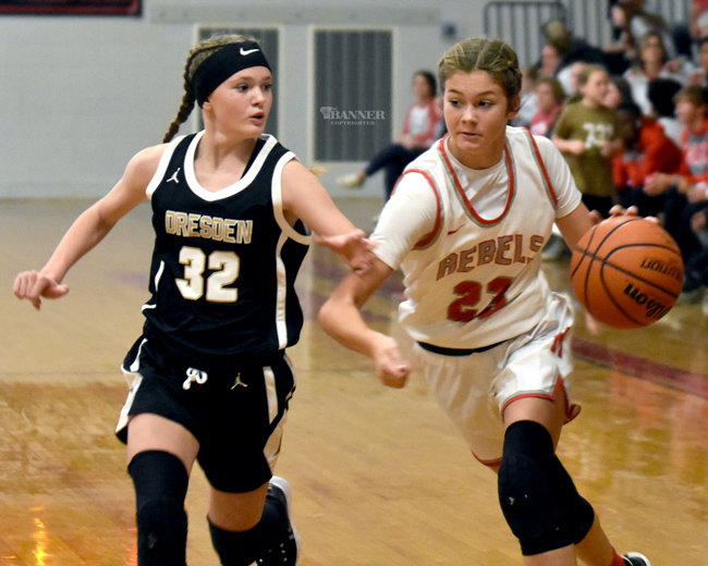 Jaycee Stafford (23) drives for a basket against Dresden.