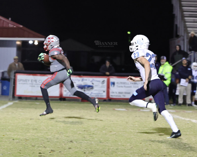 A common sight — Marquez Taylor runs past his defenders for a TD.
