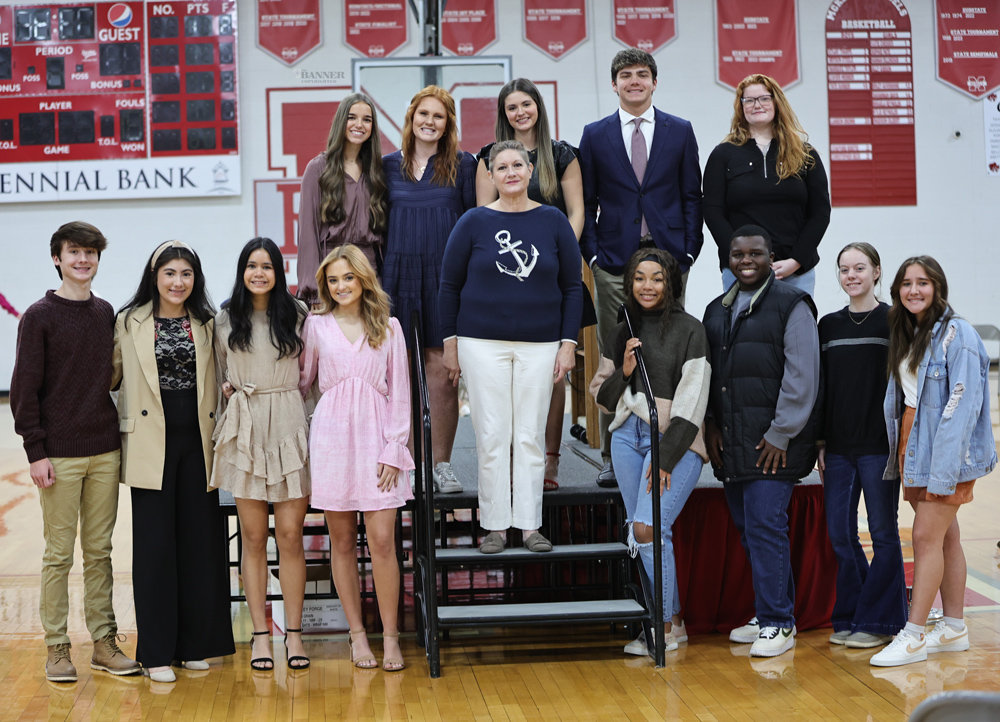 Bottom Row: Mark Schultz, Jacquelyn Padilla, Skyelor DeLoach, Brett Toombs, Taniyah Diggs, Carlton Townes, Olivia Lane and Gracie Aird. Top Row: Allie Mansfield, Payton Ognibene, Lilly Sumrok, Tate Surber and Ally Rayburn. The featured speaker, Cheryl Mosley stands in the middle of the students.