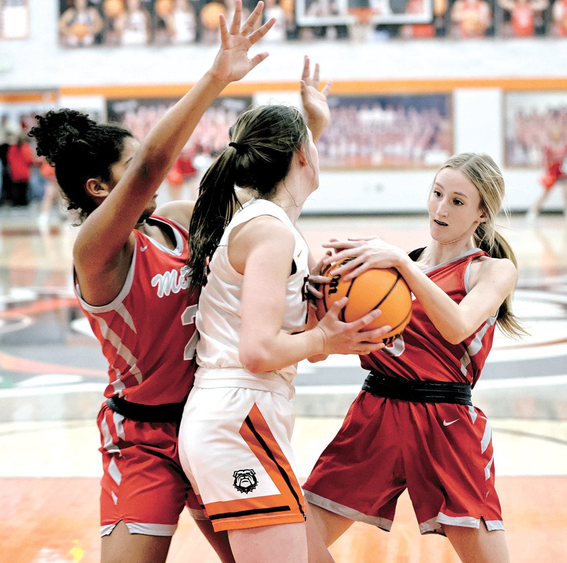 McKenzie's Sophie Pate attempts to gain control of the ball.