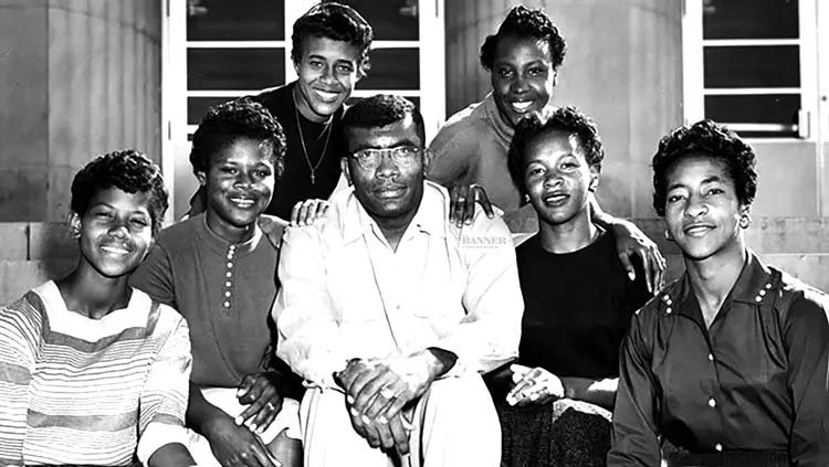 Tennessee State University track coach, Ed Temple, center, had six Tigerbelles, Wilma Rudolph, left, Isabelle Daniels, Willie B. White, Lucinda Williams, Mae Faggs, and Margaret Matthews, compete in the 1956 Olympic Games.